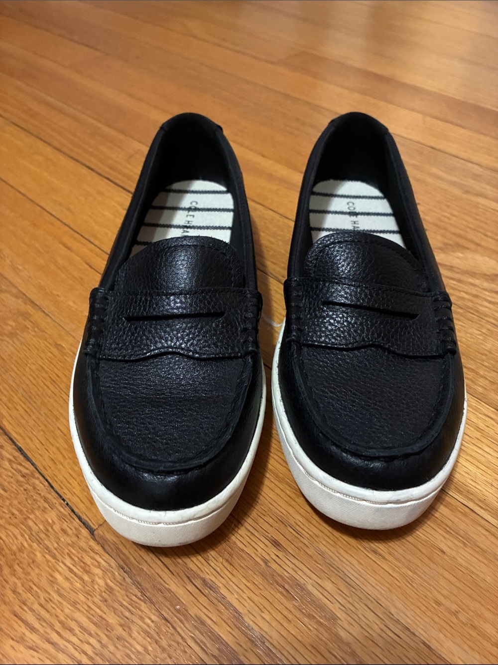 Cole Haan Black Leather Nantucket Slip-On Penny Loafers with White Platform Sole